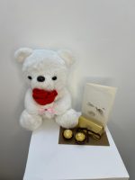 Teddy Holding Rose