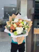 Sweet Glow Champagne Daisy Hand Bouquet