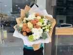 Sweet Glow Champagne Daisy Hand Bouquet - Image 2
